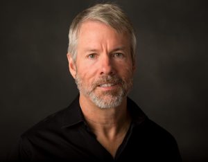 Michael Saylor is the Executive Chairman of MicroStrategy (MSTR), a publicly traded business intelligence firm & holder of ₿214,246 that he founded in 1989.